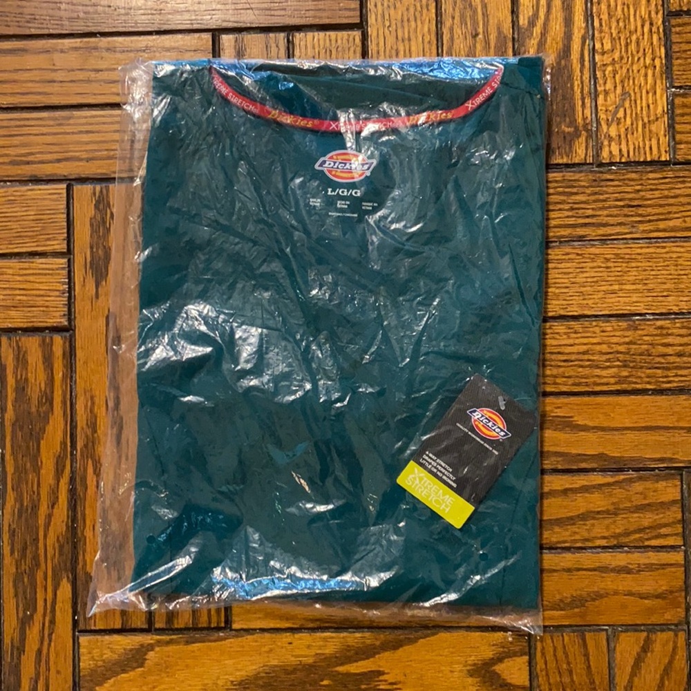 Hunter green scrub top new in package.